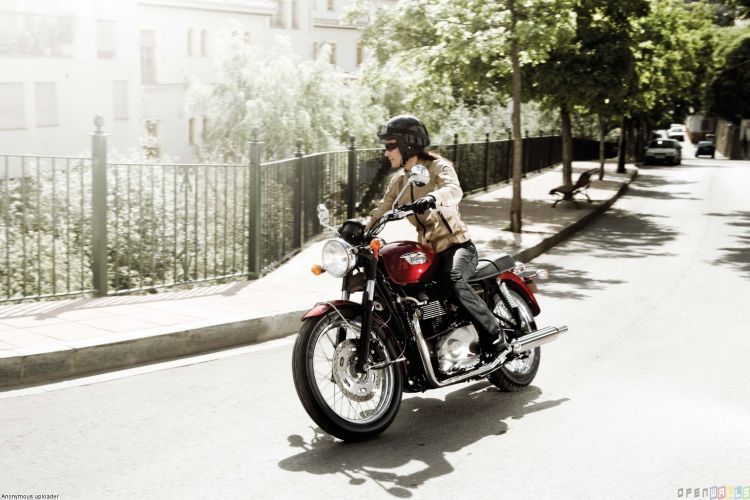 Girl riding a triumph