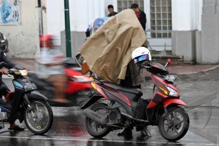 Pakai ponco dulu