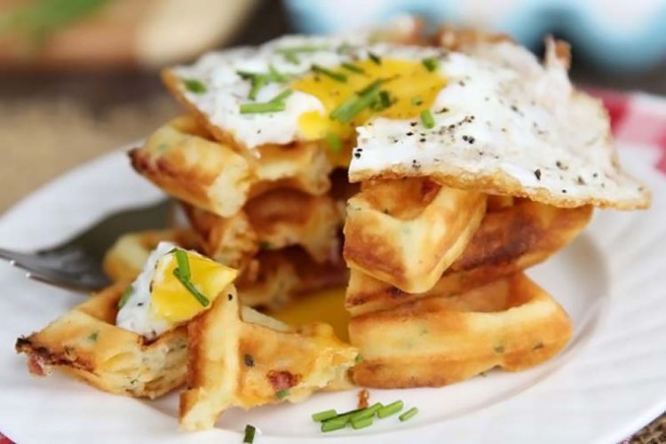 Ham-and-Cheddar-Waffles-with-Fried-Egg-from-Our-Best-Bites1-590x393