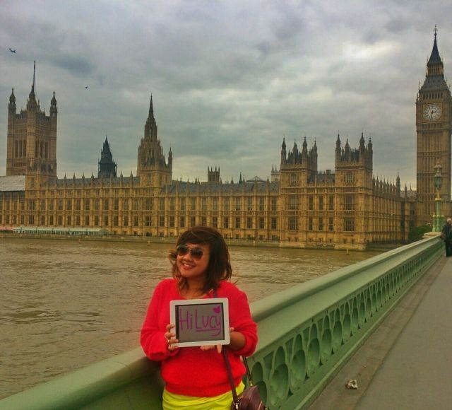 She's in front of Big Ben!