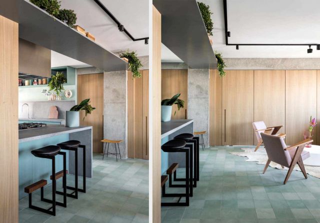 Desain open plan dalam apartemen yang menghubungkan dapur dengan ruang keluarga //