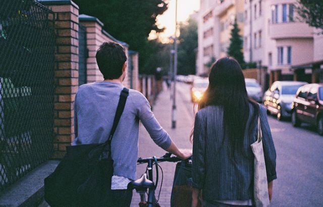 A man and a woman walking