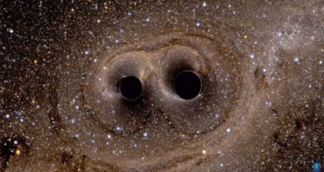 tumbukan dua blackhole yang menciptakan gelombang gravitasi