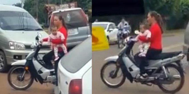 coba kalau kamu lewat sambil ngebut terus ada ibu-ibu gendong bayi kayak gini. dua-duanya membahayakan ;(