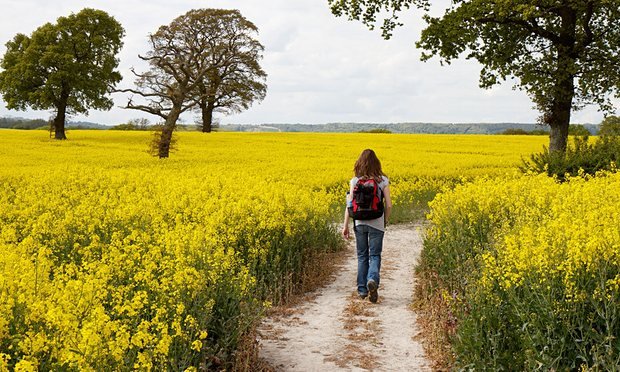 Woman-walking-along-a-pat-009