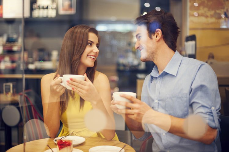 Two people in cafe enjoying the time spending with each other