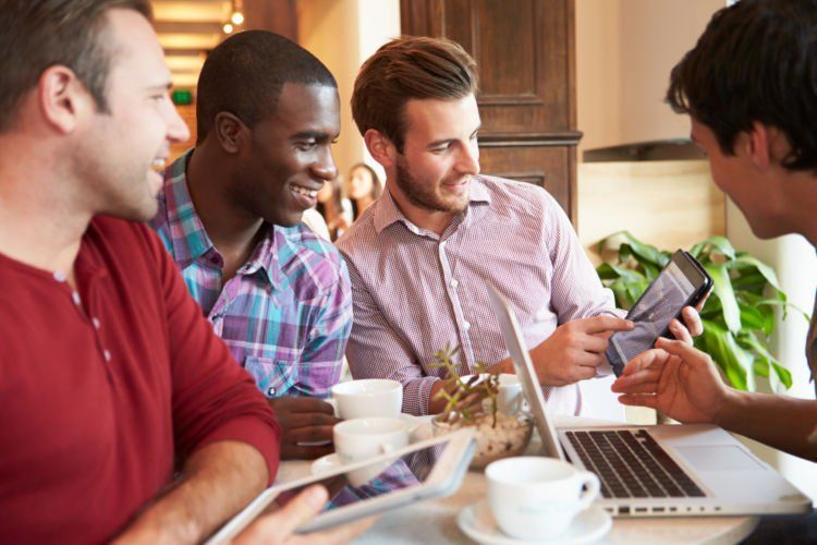 Group Of Male Friends Meeting In CafÃƒ?Ã‚?Ãƒ?Ã‚Â© Restaurant