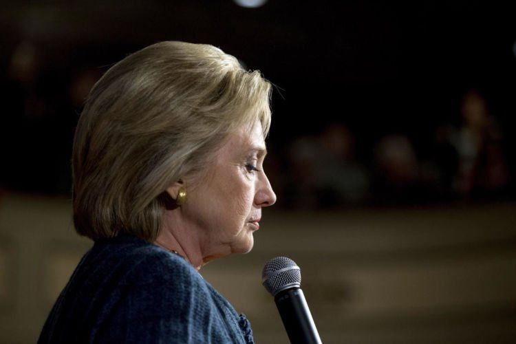 Democratic presidential candidate Hillary Clinton pauses while speaking at a rally at the Steyer Opera House at Hotel Winneshiek in Decorah, Iowa, Tuesday, Jan. 26, 2016. (AP Photo/Andrew Harnik)