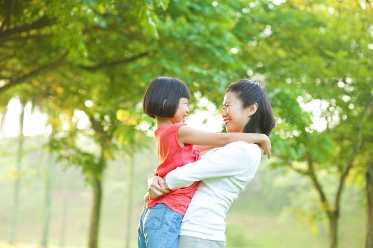 bigstock-asian-mother-hugging-her-daugh-36498718