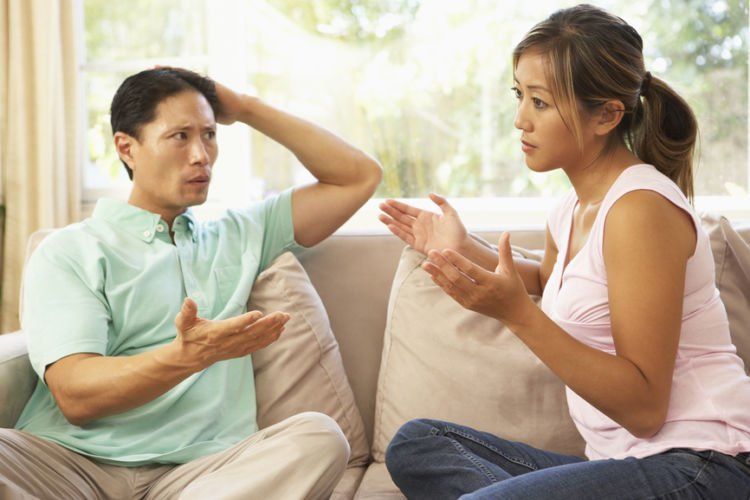 Young Couple Having Argument At Home