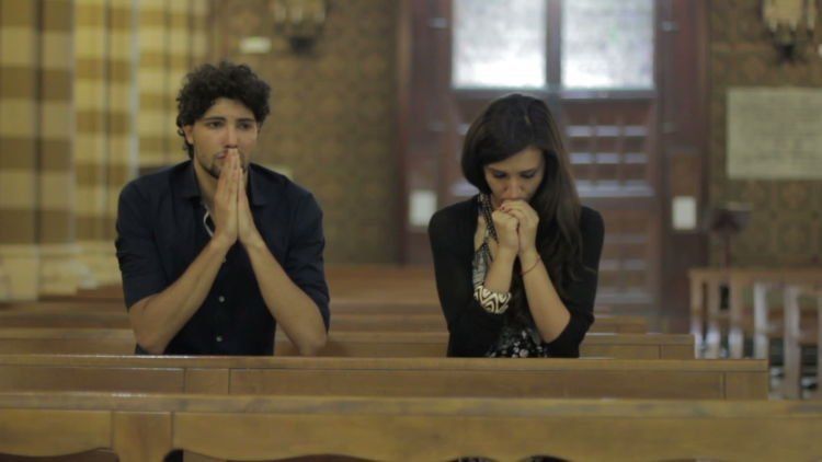 stock-footage-couple-desperate-prayer-in-a-church