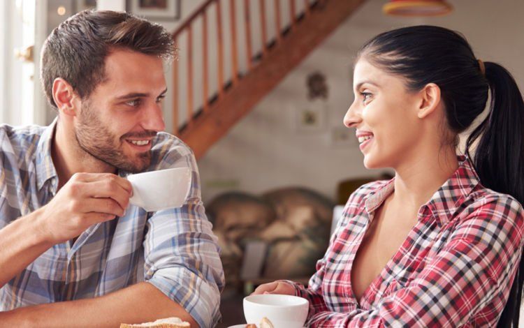 Couple meeting in a cafe ejoying a coffee together