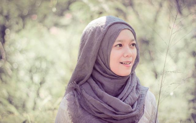 Senyum muslimah