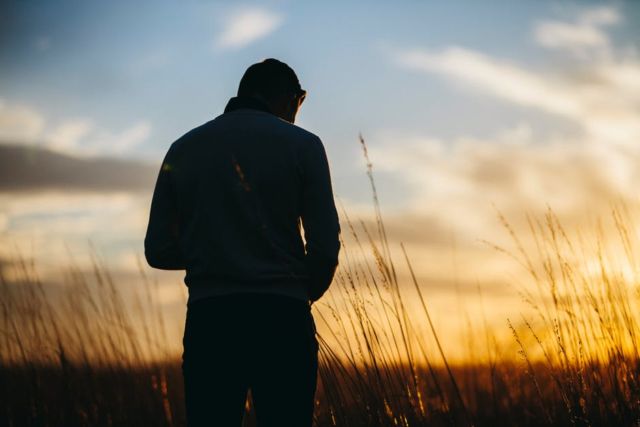 silhouette-photography-of-a-man-standing