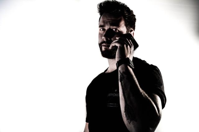 adult-beard-casual-cellphone