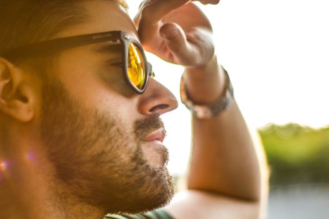 men-s-black-framed-sunglasses-shined-by-the-bright-sun