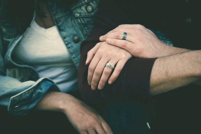 man-and-woman-couple-wearing-their-silver-couple-bond-ring