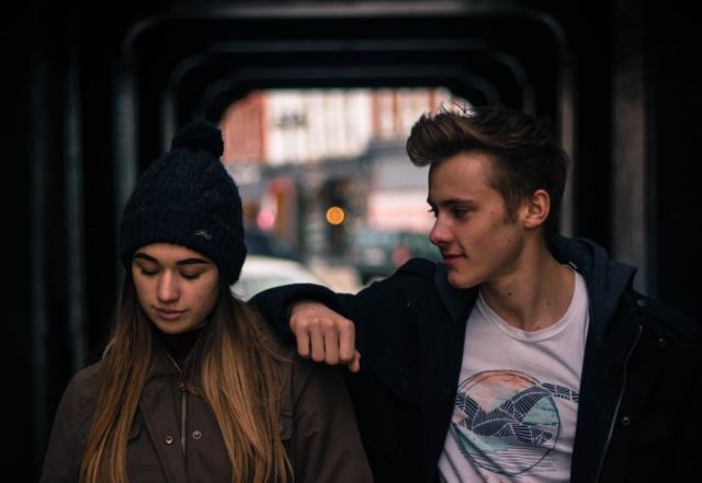 young-couple-in-city-at-night