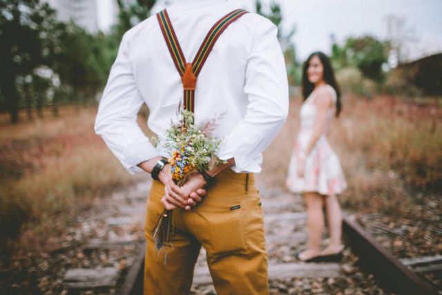 adult-blur-bouquet-boy