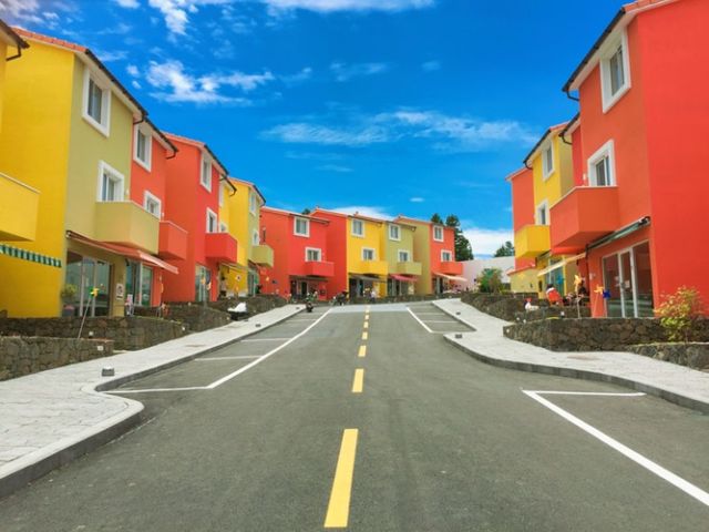 Brightly colored houses road