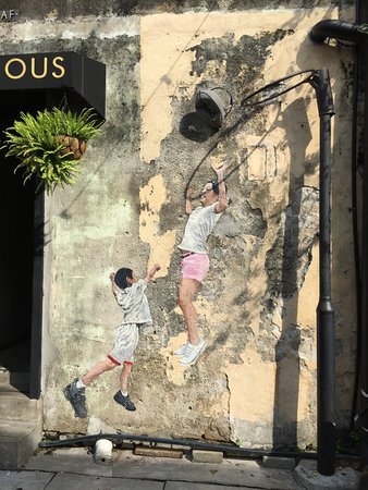 Brother and Sister Playing Basket Ball