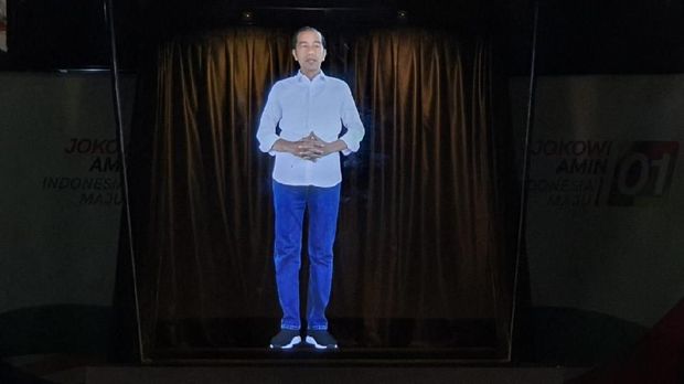 Jokowi-Ma'ruf Luncurkan Kampanye Hologram Demi Lebih Menjangkau Daerah Padat. Efektifkah?