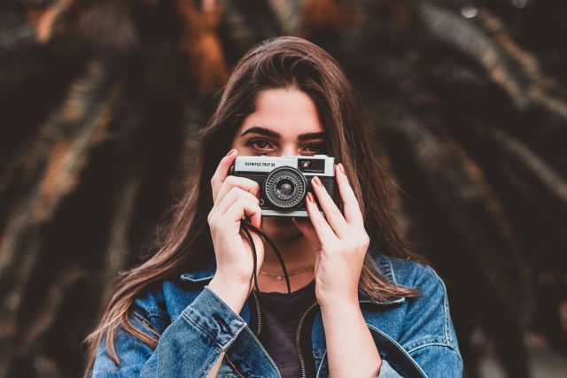 woman holding camera