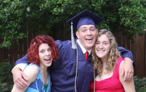 Siblings Graduation Hug