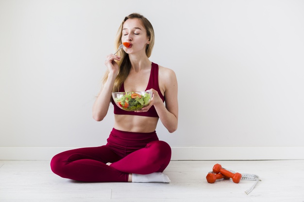 Diet Concept with Sport Woman and Healthy Food