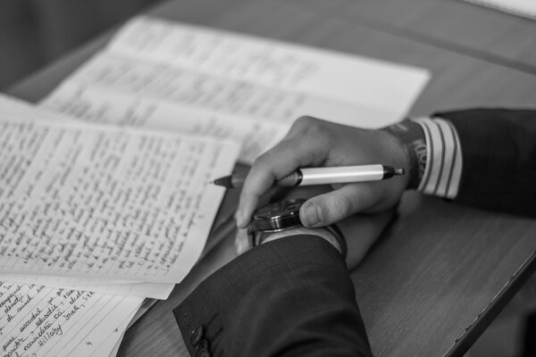 Person Holding Pen by Todoran Bogdan on Pexels