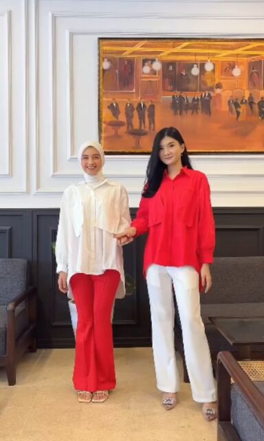 oversized shirt and red and white flare pants